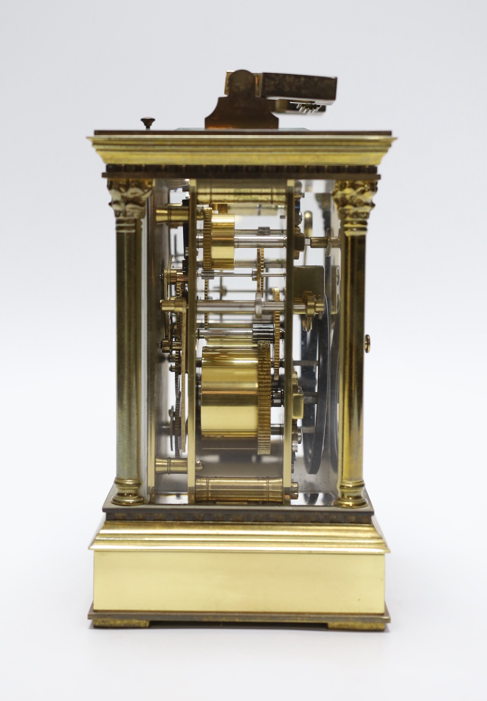 A large brass cased carriage clock retailed by St. James, 17cm